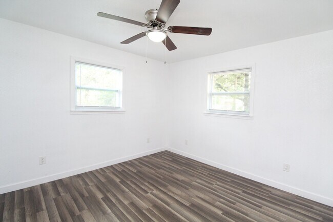 Building Photo - 4BR Home with LVP Flooring, Open Layout & Large Backyard Near Dogwood