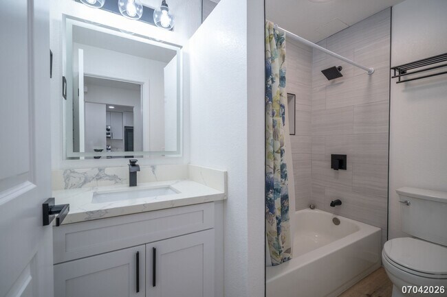 Building Photo - Rarely available ground floor townhome unit! 2 bdrm/2 bath/1 parking at Waiau Gardens Villa in Pe...