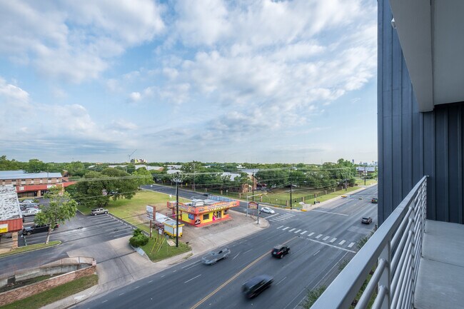 Building Photo - South Austin 2BR Condo with Balcony & Luxury Amenities