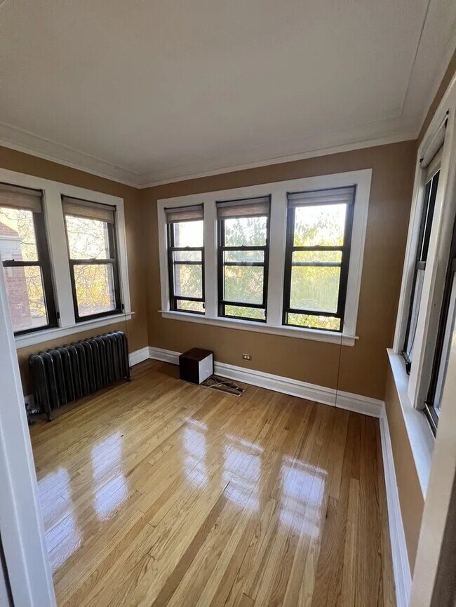 Building Photo - 6830 S Paxton Ave