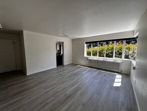 Building Photo - Cute and Cozy East Queen Anne Condo with 2 Bedrooms, 1 Bath and 1 Covered Parking Space