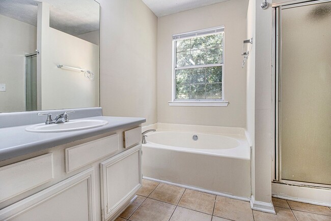 Building Photo - Rare Find: 4 Bedroom + 3 Bathroom + 2-Car ...