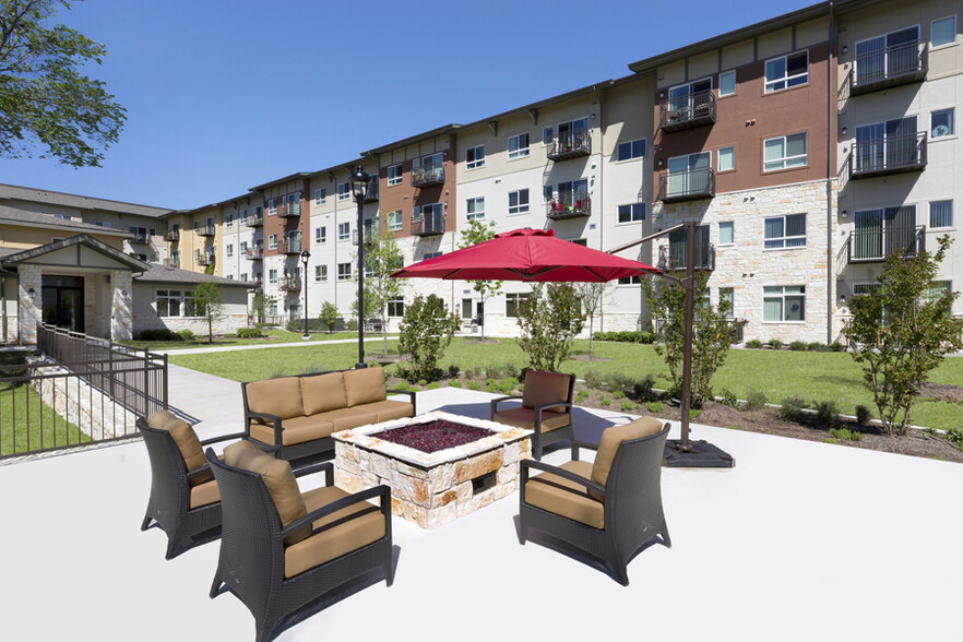 Outdoor Firepit and Community Patio - Affinity at Wells Branch 55+