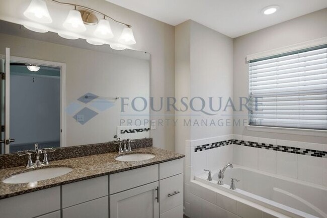 Building Photo - Spacious 3-Story Townhome with Bonus Suite & 2-Car Garage – In the Heart of RTP