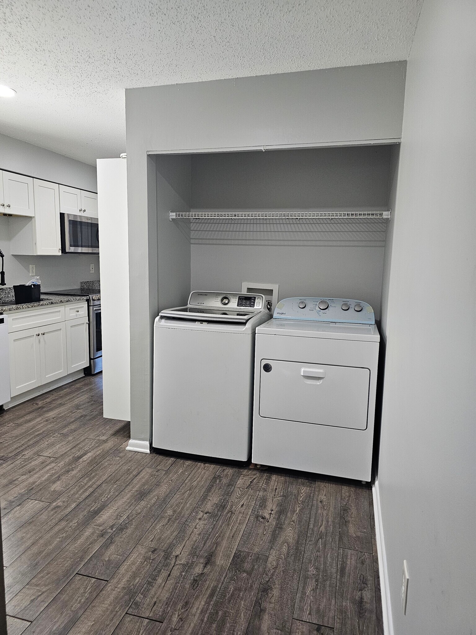 Perfectly situated right off the kitchen corner to keep your daily laundry tasks quick and effortles - 8582 Chesapeake Blvd