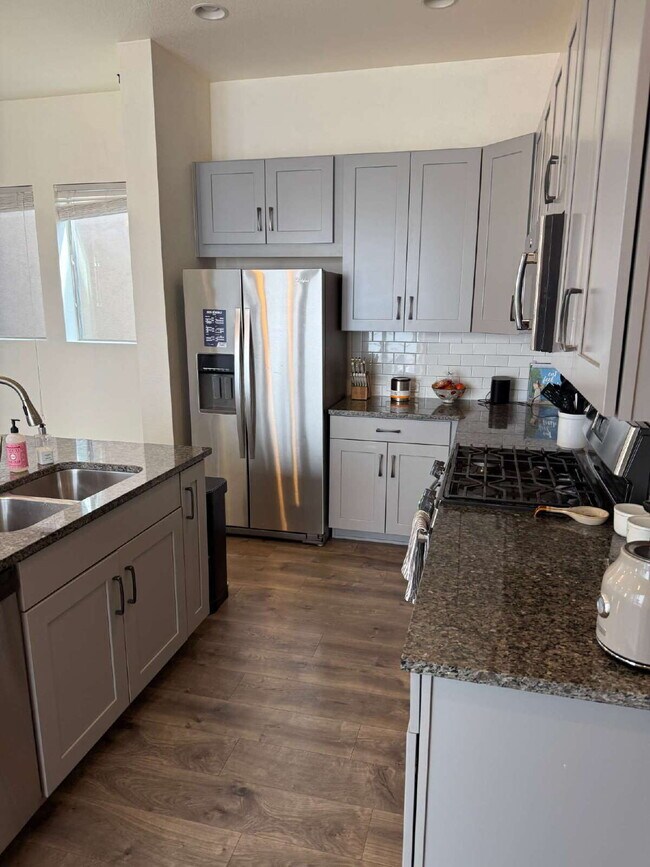 Building Photo - "Spacious 4-Bedroom Sanctuary with 3.5 Bat...