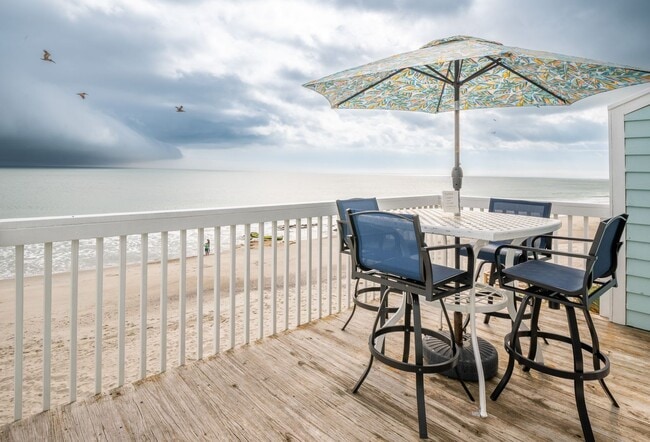 Building Photo - NEW OWNERS OF THIS FURNISHED OFF-SEASON RE...