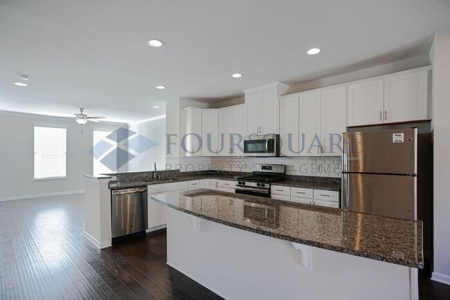 Building Photo - Spacious 3-Story Townhome with Bonus Suite & 2-Car Garage – In the Heart of RTP