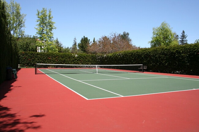 Building Photo - Top Floor Unit - Balcony - Elevator Access - Community Pool & Tennis Court