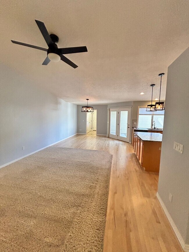 Building Photo - Spacious Duplex with 3-Car Garage & Private Patio!