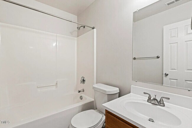 Building Photo - Earn Wealth While Leasing - Like a Homeown...