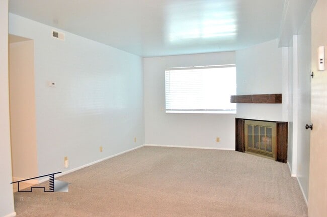 Building Photo - Lower-Level Roy 2 Bedroom, 1 Bathroom Condo Available!