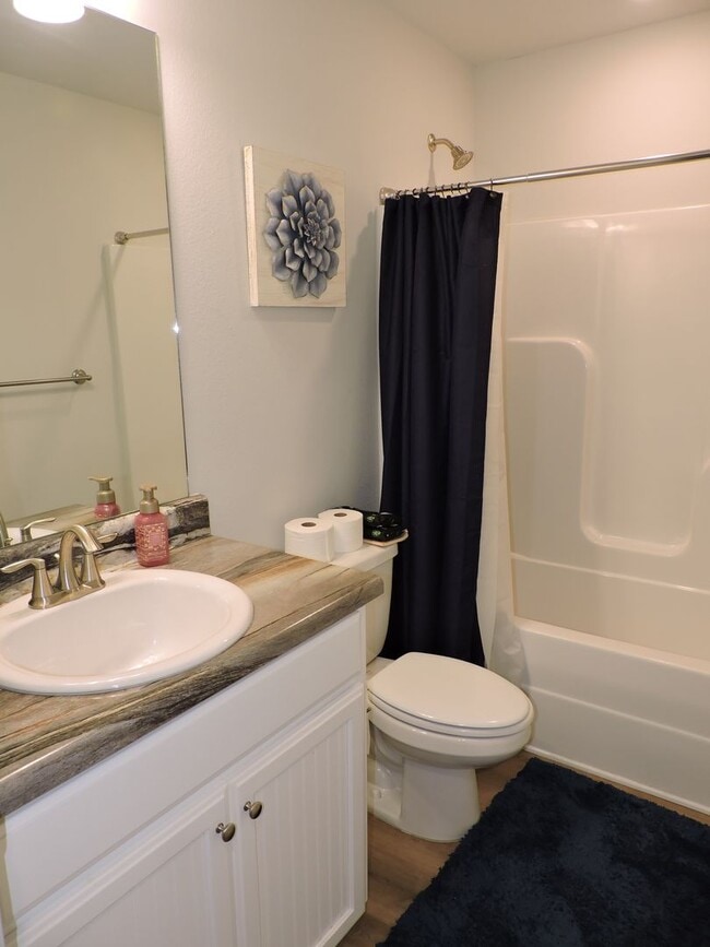 Building Photo - Almost new four bedroom home with solar pa...