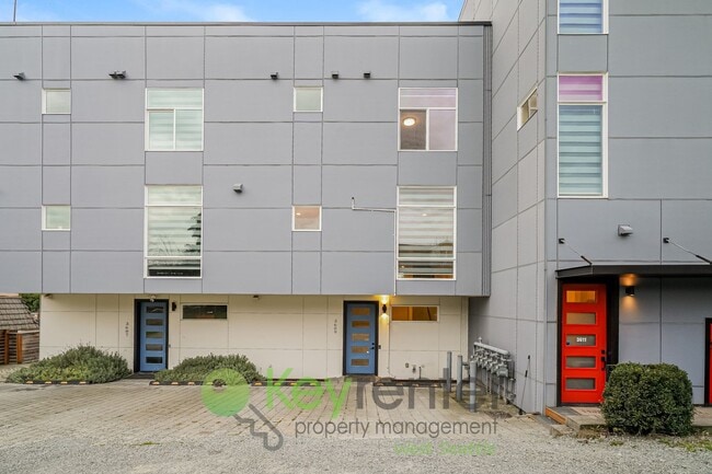 Building Photo - Rooftop Living with Open Concept Design and Parking Included