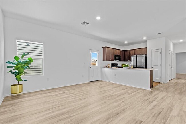 Building Photo - 7711 Poppy Petal Dr