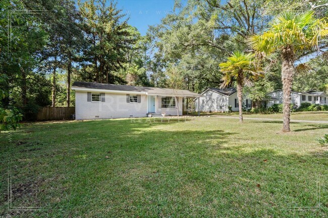 Building Photo - Stylish 3 Bed Brick Home | Modern Kitchen + Large Private Backyard