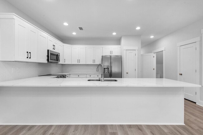 Building Photo - Modern 4BR Home with Private Fenced Yard Near the Beach