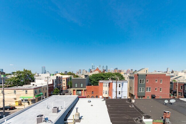 Building Photo - Three Bedroom Point Breeze Townhome w Roof Deck!