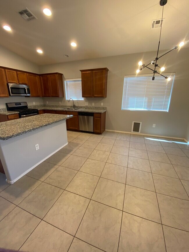 Building Photo - 8990 W Cloudwood Dr