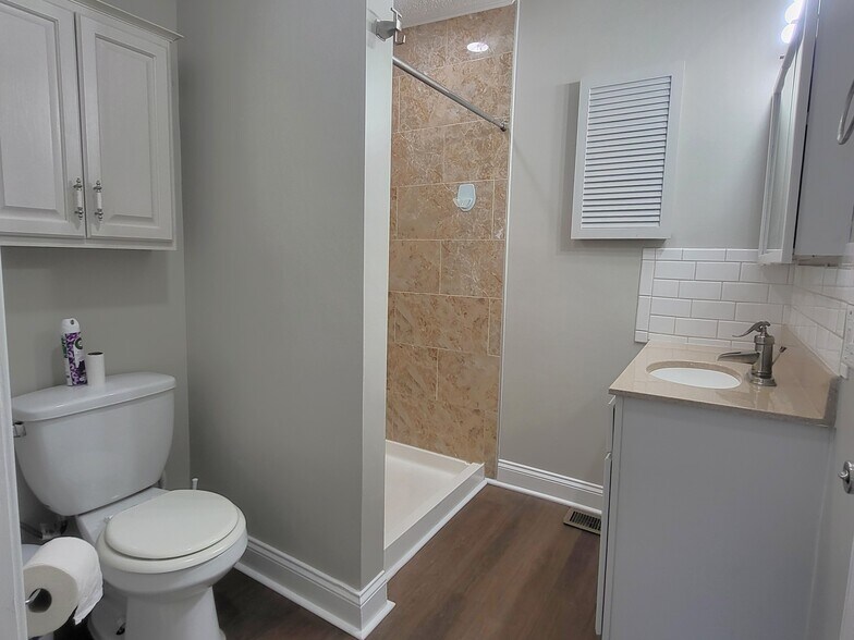 Bathroom with custom tiled shower - 1429 Virginia Ave