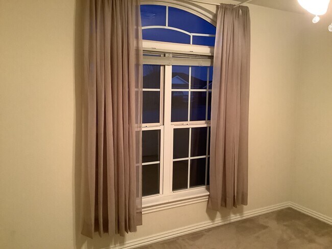 Guest bedroom (east) window - 431 Firewood Dr