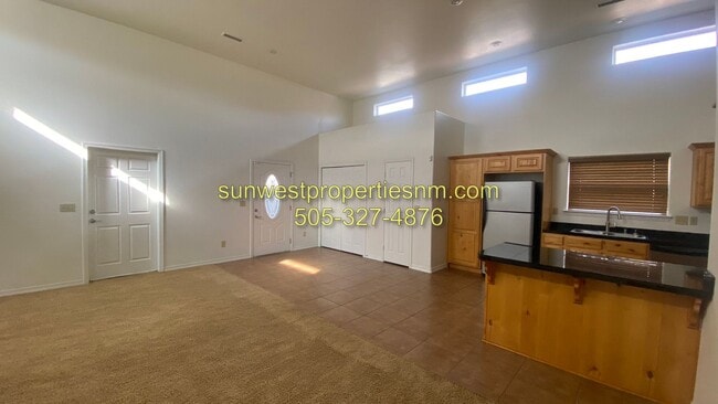 Building Photo - 3 Bedroom, 2 Bathroom Condo with 2 Car Gar...
