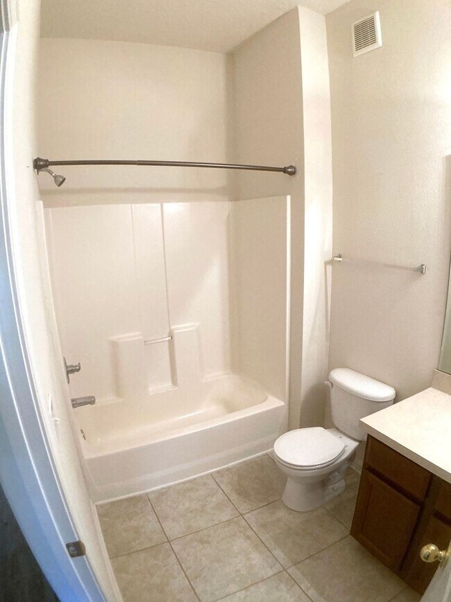 Building Photo - Spacious 3-Bedroom Condo with Pond Views &...