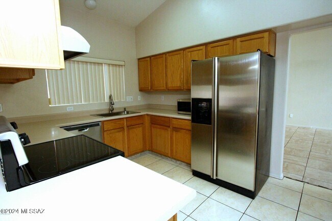 Building Photo - 9465 N Elan Ln