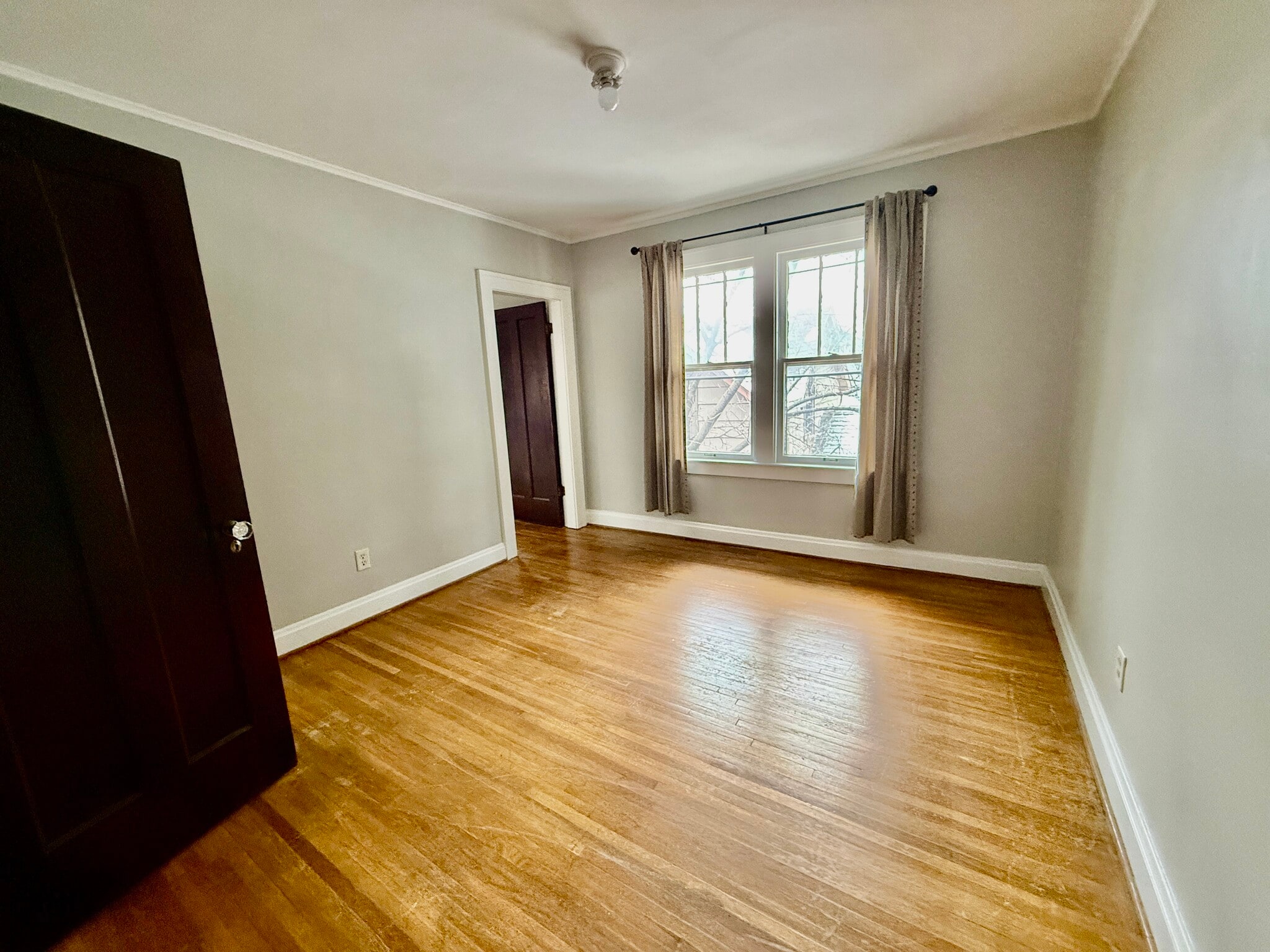 Primary bedroom from hallway - 40 W Tompkins St