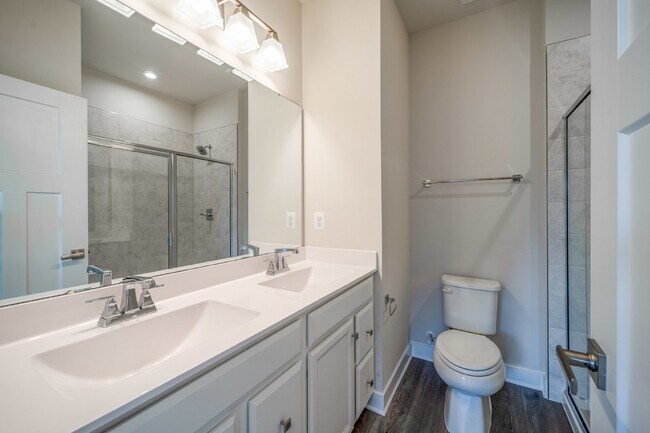 Building Photo - This 3-bedroom, 3-full bathroom townhouse offers a pristine and contemporary living experience.