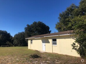 Building Photo - Cozy 2BR/1BA Dade City Home w/Private Porc...