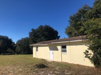 Building Photo - Cozy 2BR/1BA Dade City Home w/Private Porc...