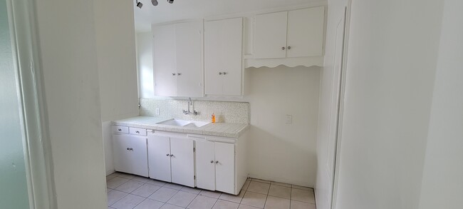 Kitchen from dining room - 11683 Chandler Blvd