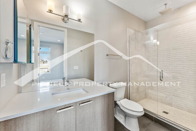 Building Photo - Fantastic Townhome with A Roof Top Patio, Attached Garage, and Central AC!