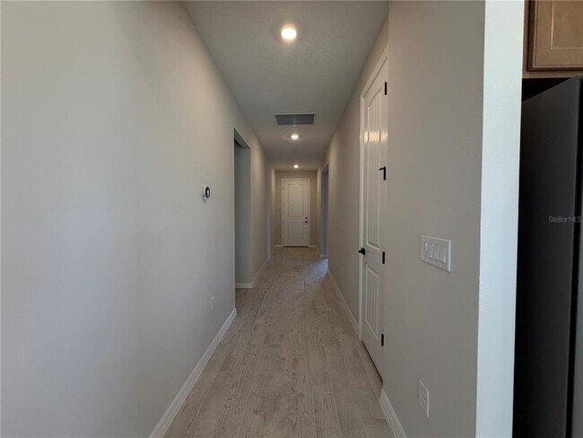 Building Photo - 5648 Flame Vine Wy