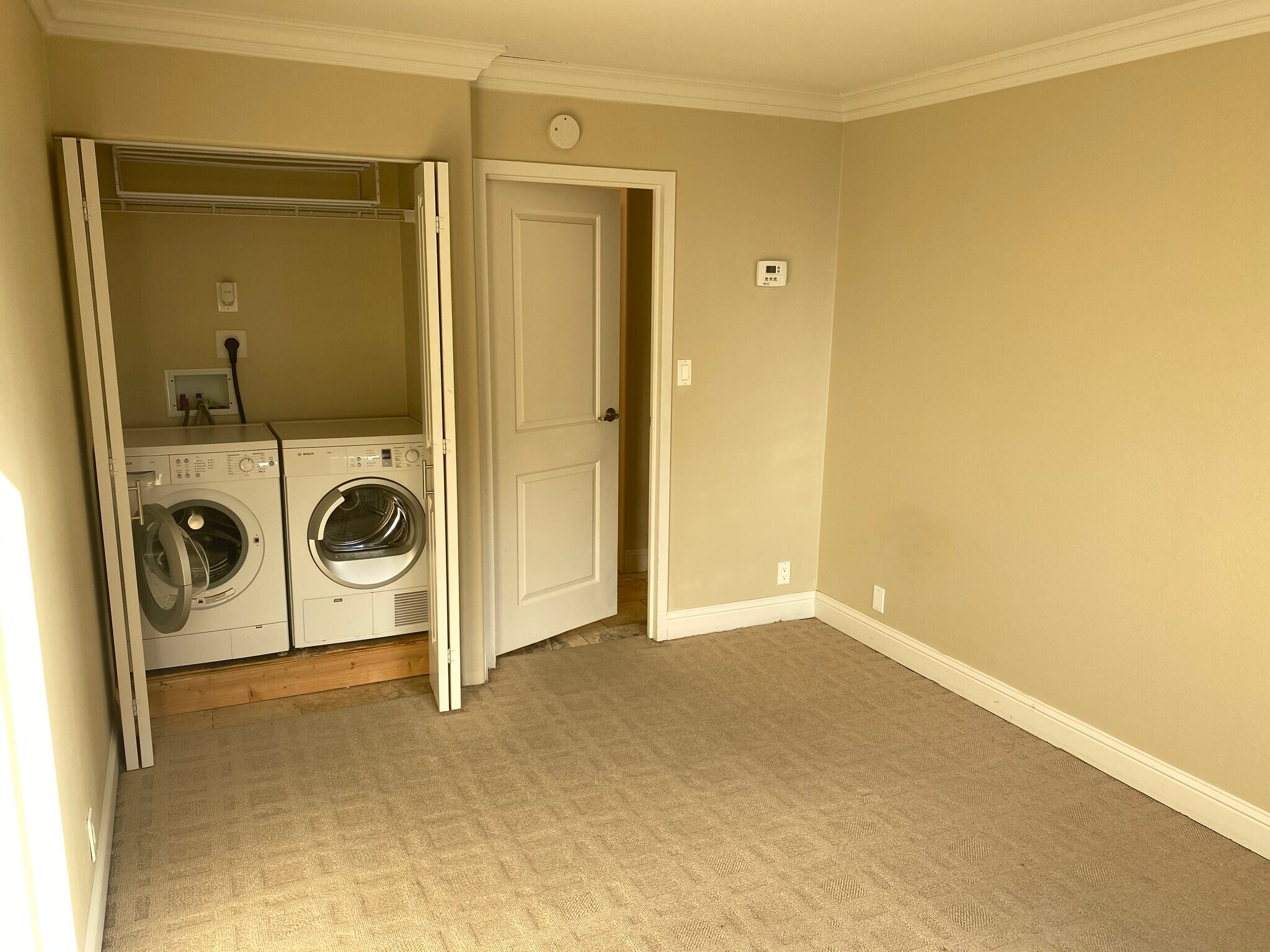Unit Bedroom with Washer/Dryer in Closet #2 - 700 E 8th St