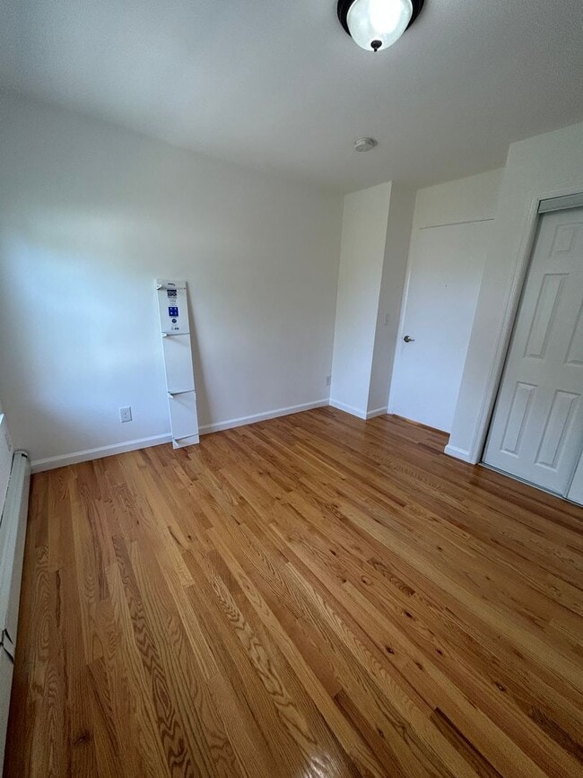 Building Photo - Discover Your Dream Home in Neptune: Spacious 4-Bedroom, 2.5-Bath with Private Backyard and Drive...