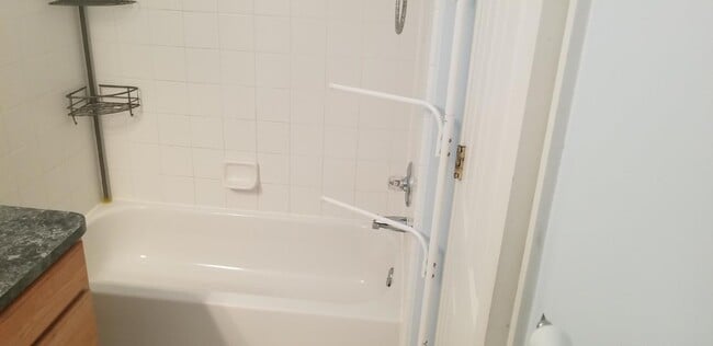 Building Photo - 2 Bedroom, 1.5 Bath Townhouse w/ Garage & Huge Master Bedroom. Full Sized Washer & Dryer In Unit.