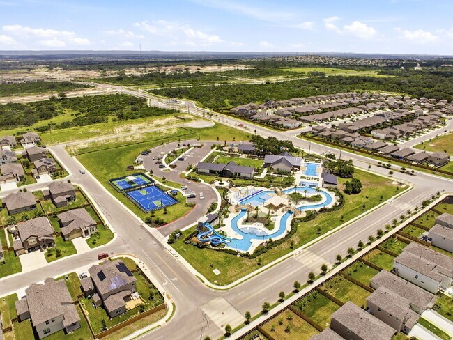 Building Photo - RESORT STYLE AMENITIES!! Multiple Pools. Lazy River. Splash Pad and Water Slides. Fitness Center....