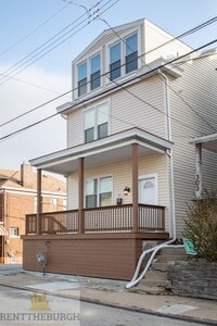 Building Photo - Updated 4BR House with 2 full baths and yard!