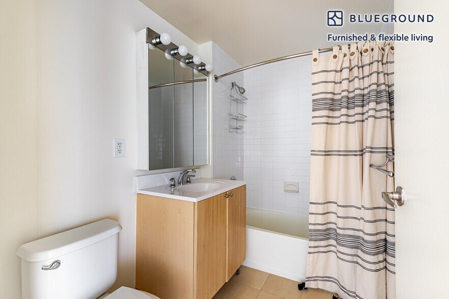 Building Photo - 4-75-75 48th Ave