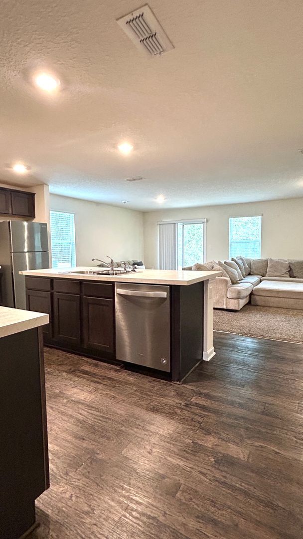 Building Photo - 4BR Home with Solar Panels + Whole-Home Water Filtration