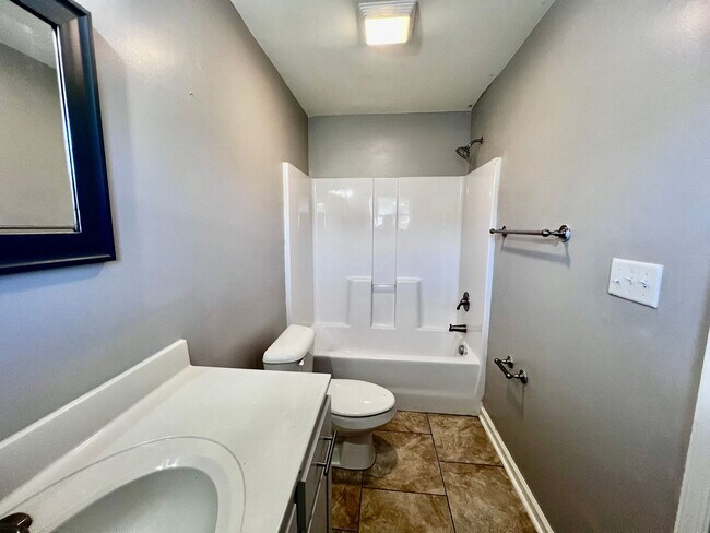 Building Photo - Tri-Level Condo – Pets Welcome, Washer & D...