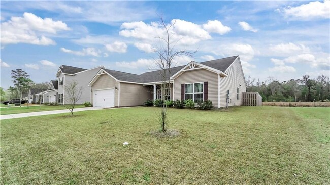 Building Photo - Relax & Unwind at this 4-Bedroom Home with Scenic Lagoon Views in Rincon
