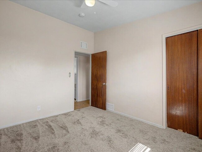 Building Photo - Charming 3-Bedroom Home with Spacious Yard & Versatile Storage!