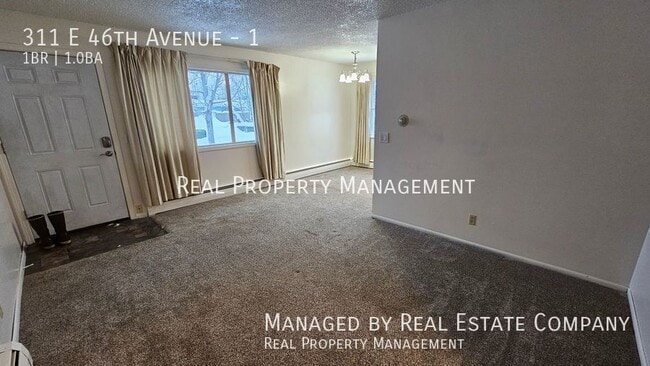 Building Photo - 311 E 46th Ave