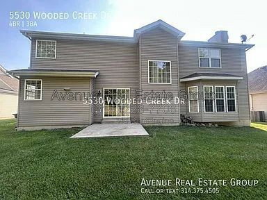 Building Photo - 5530 Wooded Creek Dr