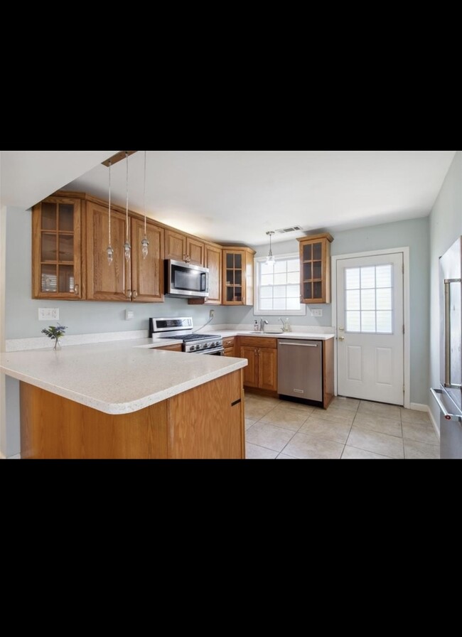 Kitchen with Stainless appliances - 6800 Louisville St