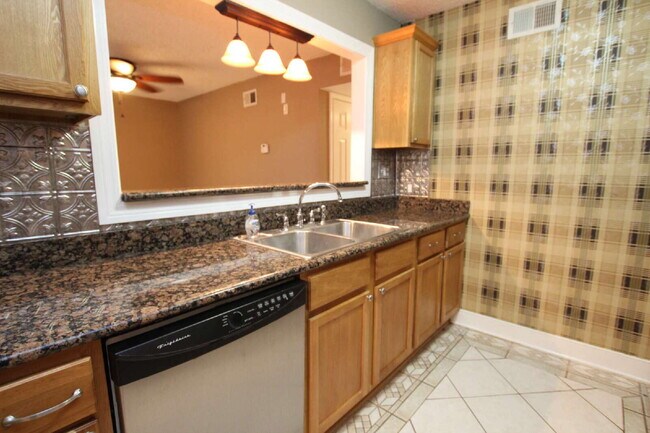 Building Photo - Coastal Condo Living with Pensacola Bay Views, Waterfront Pool Access & Prime Location Near Downt...
