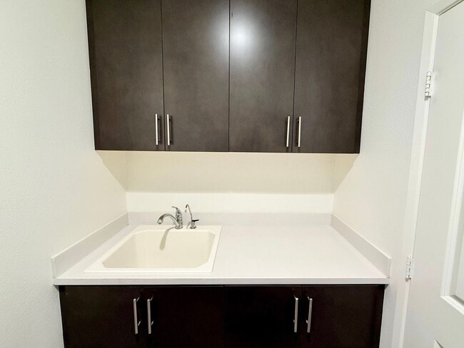 Building Photo - Stunning 3-Bed/2.5-Bath End Unit Condo with Solar & Large Yard